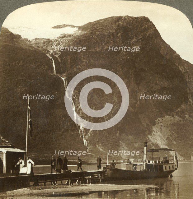 'Utigards Falls from Ravnefjeld glacier at Lake Loen - from Naesdal, Norway', c1905. Creator: Unknown.