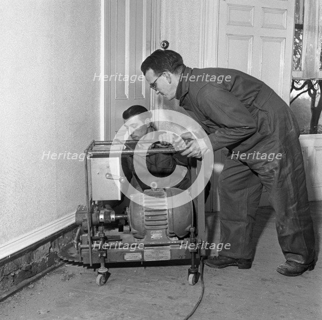 Damp proofing, Goldthorpe, South Yorkshire, 1957. Artist: Michael Walters