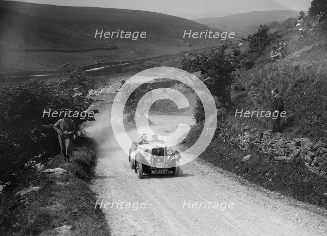Singer of J Selwyn competing in the MCC Edinburgh Trial, West Stonesdale, Yorkshire Dales, 1933. Artist: Bill Brunell.