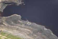 A ruined building revealed by low water levels at Howden Reservoir, Sheffield, 2022. Creator: Emma Trevarthen.