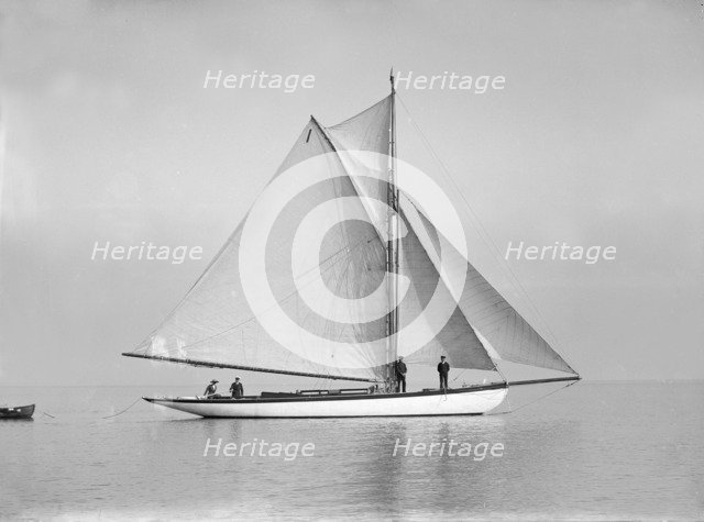 The cutter 'Wenda' in light winds, 1912. Creator: Kirk & Sons of Cowes.