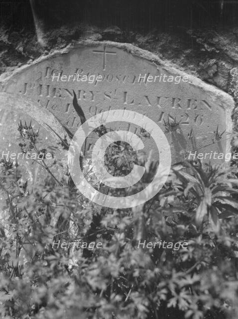 Tombstone in St. Louis Cemetery, New Orleans, between 1920 and 1926. Creator: Arnold Genthe.