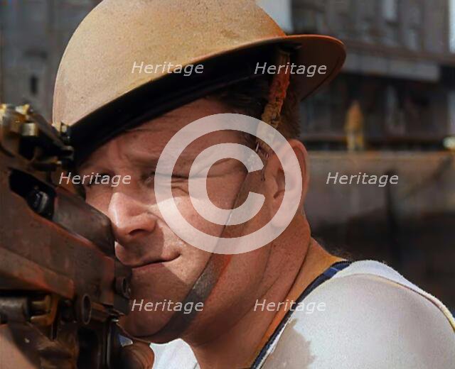 British Sailors Mounting Machine Guns To Small Boats for the Dunkirk Evacuation, 1940. Creator: British Pathe Ltd.