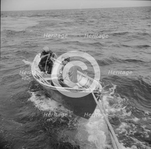 On board the fishing boat Alden, out of Gloucester, Massachusetts, 1943. Creator: Gordon Parks.