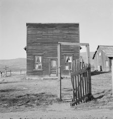 Farmer saloon and stagecoach tavern...the Ola self help sawmill co-op, Gem County, Idaho, 1939. Creator: Dorothea Lange.