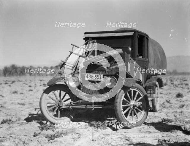 Texan refugees' car, Coachella Valley, California, 1937. Creator: Dorothea Lange.