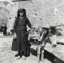 A women and her donkey, Montenegro, Yugoslavia, 1939. Artist: Unknown