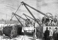 The Railway Accident at Abbotts Ripton, Huntingdon: raising an engine from the wrecked train, 1876. Creator: Unknown.