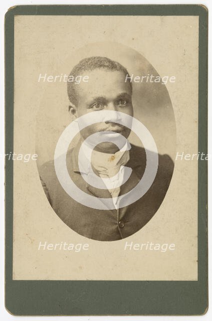 Photograph of a man wearing a suit and necktie, 1890s. Creator: Unknown.