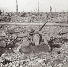 Soldier with shell, Bois d'Avocourt, Verdun, northern France, c1914-c1918. Artist: Unknown.
