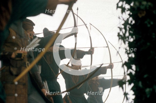 Archers in a battle re-enactment. Artist: Geoffrey Davis