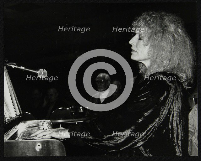 Pianist and singer Ellyn Rucker performing at The Fairway, Welwyn Garden City, Hertfordshire, 1992. Artist: Denis Williams