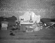Household goods of a Negro flood refugee in the temporary infirmary, Forrest City, Arkansas, 1937. Creator: Walker Evans.