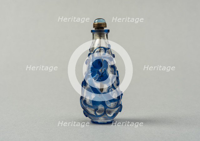 Clear glass snuff bottle with blue overlay, China, Qing dynasty, 1644-1911. Creator: Unknown.
