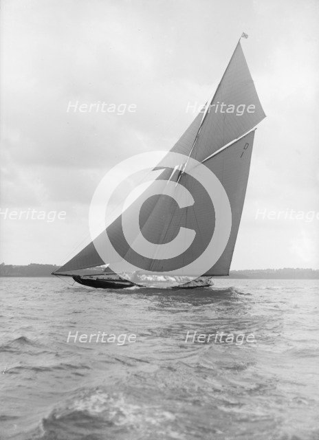 The 15 Metre sailing yacht 'Pamela' sailing close-hauled, 1913. Creator: Kirk & Sons of Cowes.