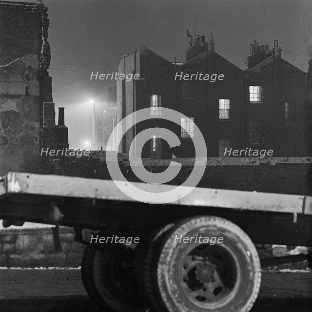 Lorry and terraced houses, Shoreditch, London, 1960-1965. Artist: John Gay