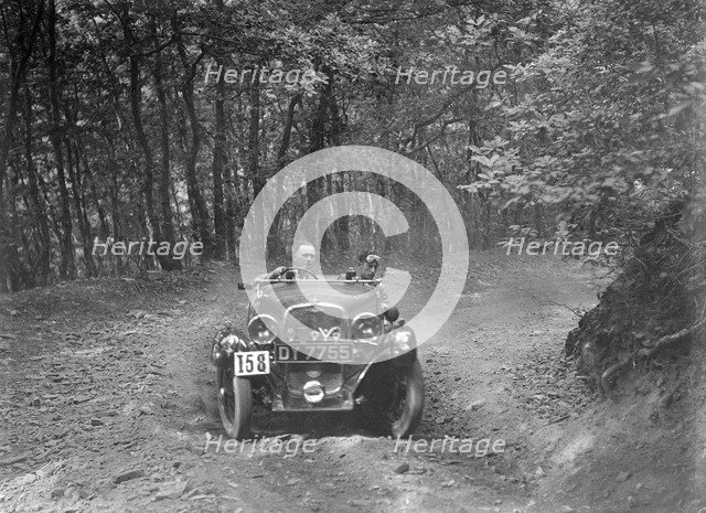 1496 cc Singer competing in the B&HMC Brighton-Beer Trial, Fingle Bridge Hill, Devon, 1934. Artist: Bill Brunell.