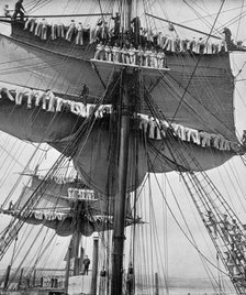 Reefing topsails on board the training ship HMS 'Impregnable', Devonport, Devon, 1896.Artist: WM Crockett