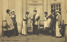 Actors, some in drag, performing at a prisoner of war camp in Belgium, (between 1910 and 1919?). Creator: Unknown.