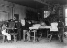 Teacher and four students making furniture at Hampton Institute, Hampton, Va., 1899 or 1900. Creator: Frances Benjamin Johnston.