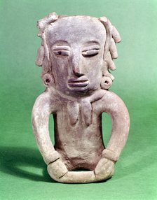 Pre-Colombian Mexican seated pottery figure. Artist: Unknown