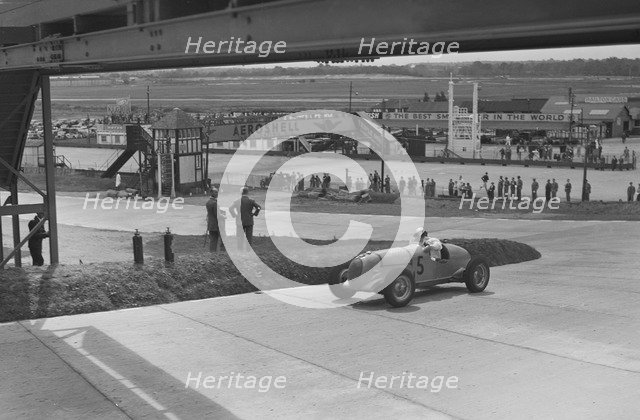 MG K3 of JHT Smith racing at Brooklands, Surrey, c1930s. Artist: Bill Brunell.