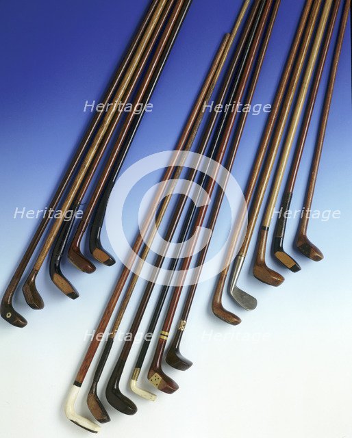 Selection of walking sticks shaped like golf clubs, 1900-1925. Artist: Unknown