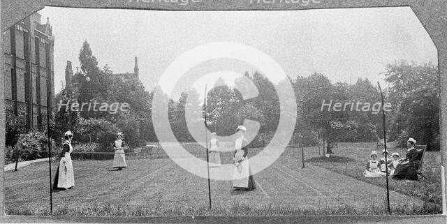 St Marylebone Infirmary, London: nurses playing tennis, 1906 (1912). Creator: Unknown.