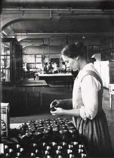 A cook makes pastry in the factory kitchens, Rowntree’s factory, York, Yorkshire, 1913. Artist: Unknown