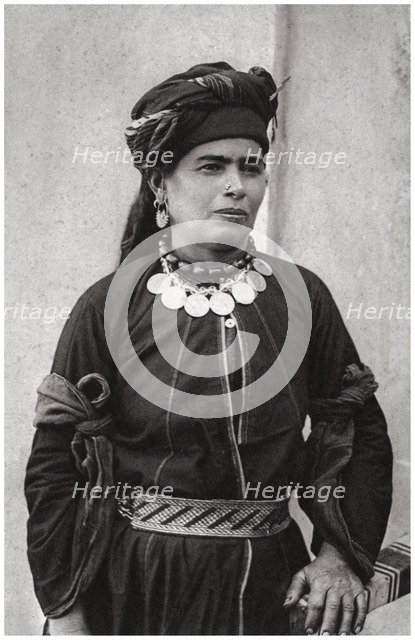 Kurdish lady in her best costume, Iraq, 1925. Artist: A Kerim
