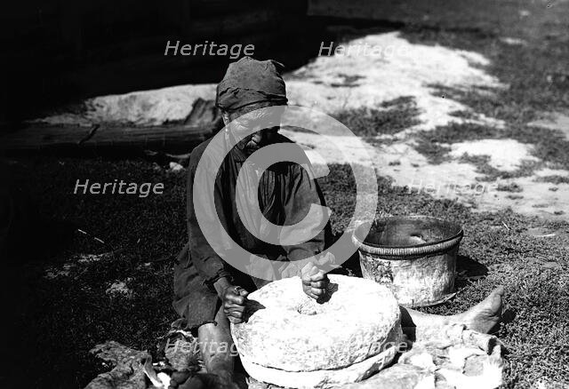Working with a flour millstone, 1890. Creator: Unknown.