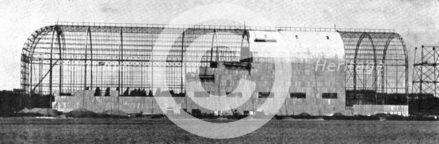 A sight England is to see before long: a shed for a dirigible balloon under construction...1909. Creator: Illustrations Bureau.