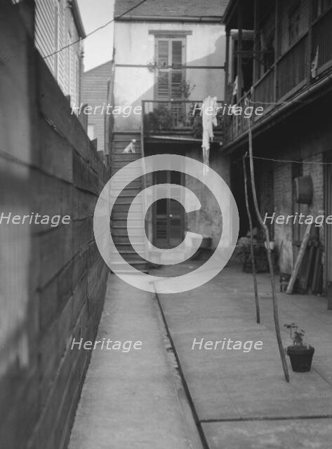 Courtyard, New Orleans, between 1920 and 1926. Creator: Arnold Genthe.
