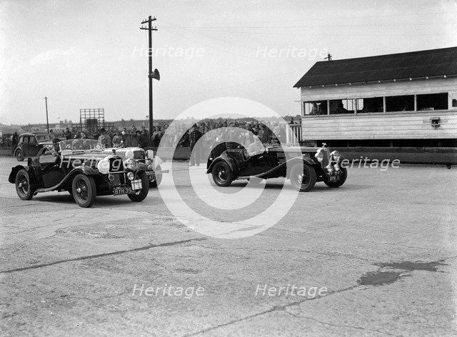 Triumph and Alvis cars at the MCC Members Meeting, Brooklands, 10 September 1938. Artist: Bill Brunell.