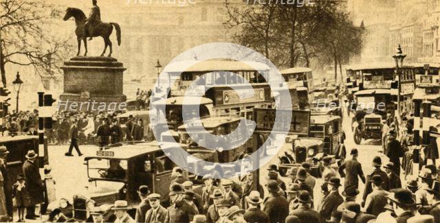 Traffic in Trafalgar Square, London, 1933.  Creator: Unknown.