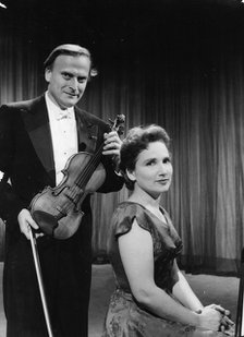 Yehudi Menuhin (1916-1999) with his sister Hephzibah Menuhin (1920-1981), American musicians. Artist: Unknown