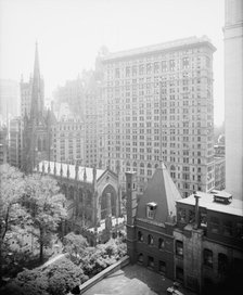 New York, N.Y., Trinity churchyard and the skyscrapers, between 1900 and 1920. Creator: Unknown.