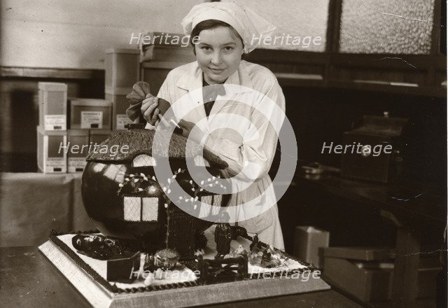 Easter egg decorated as a house, Rowntree factory, York, Yorkshire, 1936. Artist: Unknown