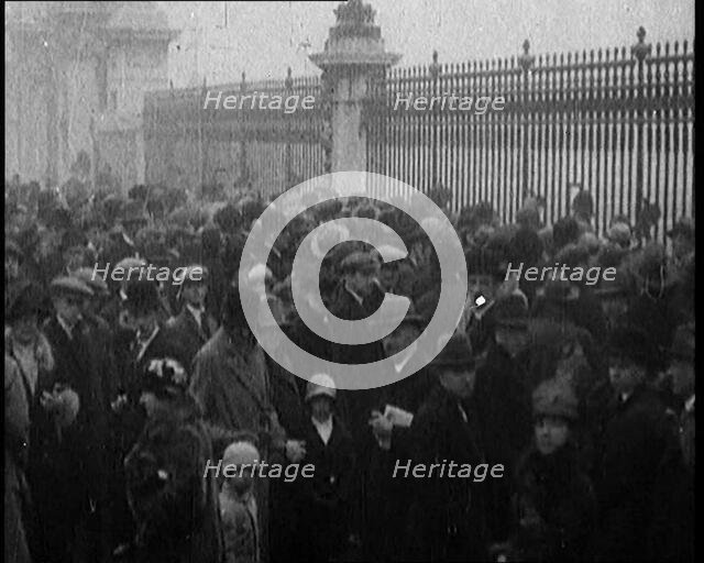 Crowds Gathering Outside of Buckingham Palace...News of the Health of King George V, 1929. Creator: British Pathe Ltd.