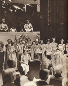 'Queen Elizabeth looks on as her husband is crowned on the day of his coronation', 1937. Artist: Unknown.