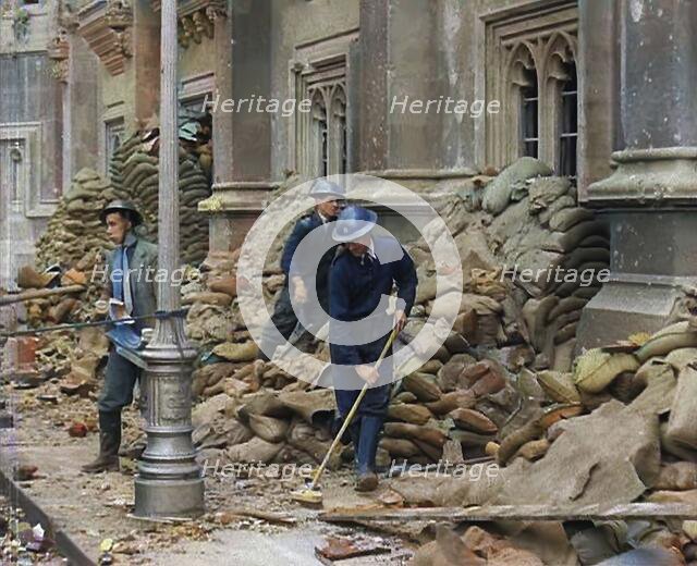 British Air Raid Wardens Clearing up Rubble Around the Palace of Westminster, 1941. Creator: British Pathe Ltd.