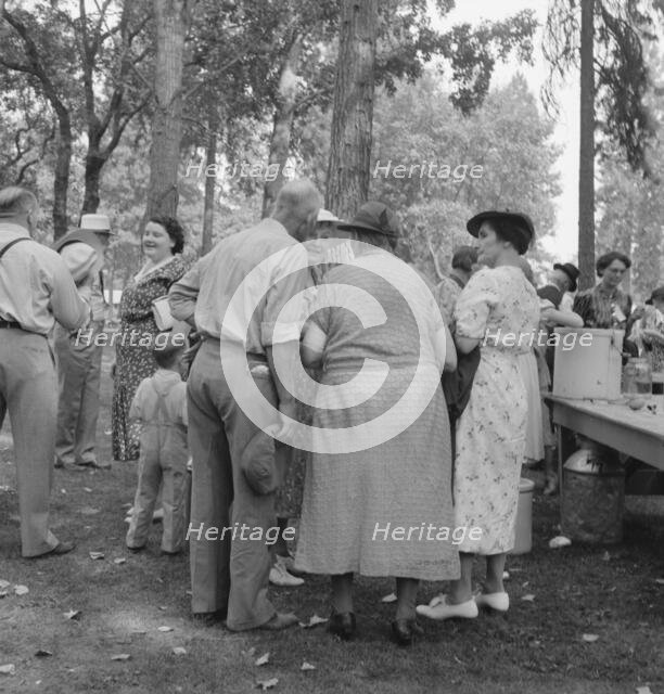 "California Day," a picnic in town park on the Rogue River, Grants Pass, Oregon, 1939. Creator: Dorothea Lange.