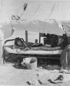 Oklahoma potato picker's family encamped on the flats near Shafter, California, 1935. Creator: Dorothea Lange.