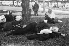 Asleep in Battery Park on hot day, between c1910 and c1915. Creator: Bain News Service.