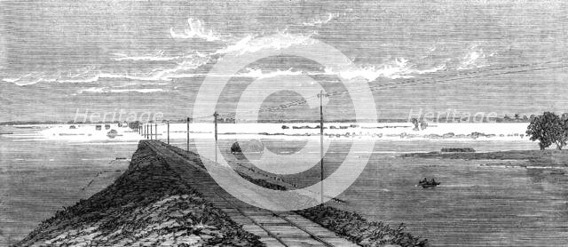 The Flood in the Fens: the submerged railway between Lynn and Wisbeach, 1862. Creator: Unknown.