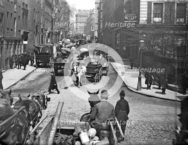 Horse-drawn vehicles in Queen Street, London, 1870-1900. Artist: York