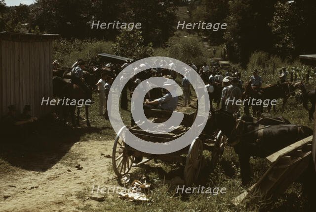 Mountaineers and farmers trading mules and horses on "Jockey St.,", Campton, Wolfe County, Ky., 1940 Creator: Marion Post Wolcott.