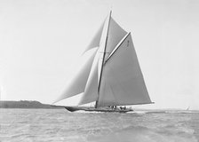 The cutter 'Shamrock' sailing close-hauled, 1912. Creator: Kirk & Sons of Cowes.