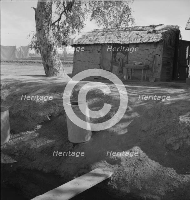 Ditch bank housing for Mexican field workers, Imperial Valley, California, 1937. Creator: Dorothea Lange.
