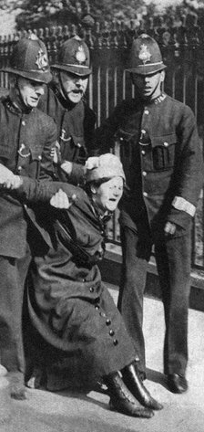 A suffragette being arrested, c1910s (1935). Artist: Unknown